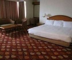 Imagen de la habitación del Hotel Kingwood Inn Kuching. Foto 10
