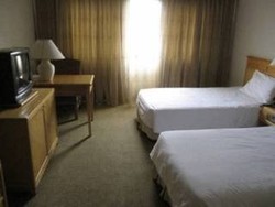 Imagen de la habitación del Hotel Kingwood Inn Kuching. Foto 11