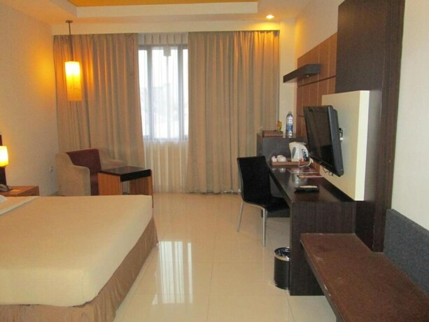 Imagen de la habitación del Hotel Kini. Foto 10