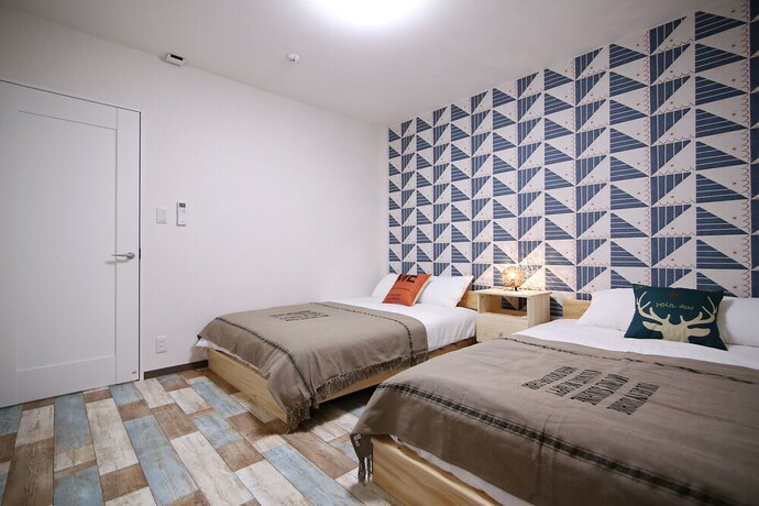 Imagen de la habitación del Hotel Kino Asakusa House. Foto 34