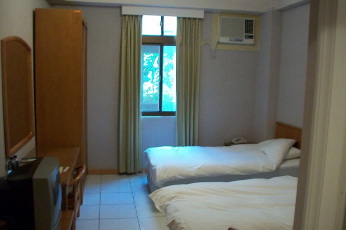 Imagen de la habitación del Hotel Kinsa Holiday. Foto 5