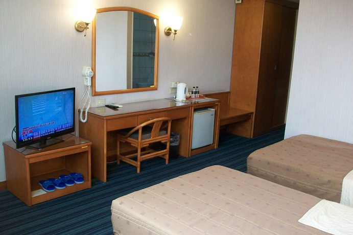 Imagen de la habitación del Hotel Kinsa Holiday. Foto 6