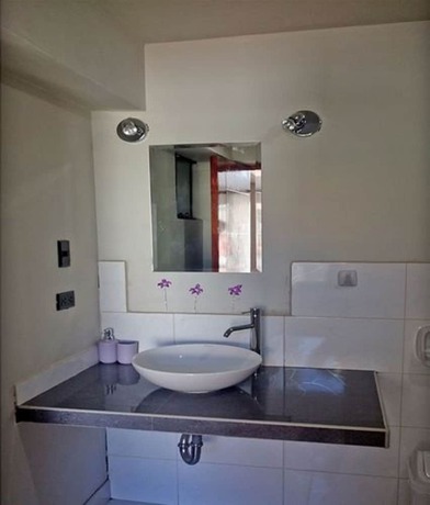 Imagen de la habitación del Hotel Kintu Apart. Foto 6