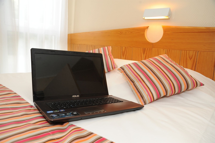 Imagen de la habitación del Hotel Kiotel Lyon Bron Eurexpo. Foto 10