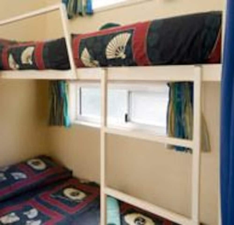 Imagen de la habitación del Hotel Kipara Tropical Rainforest Retreat. Foto 10