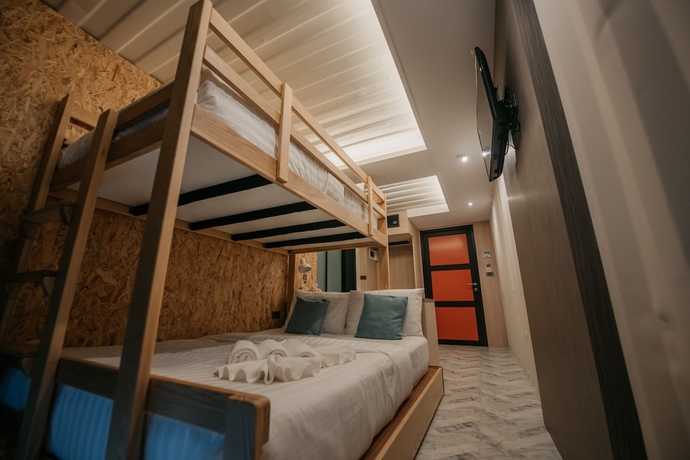 Imagen de la habitación del Hotel Kipbox Trang. Foto 9