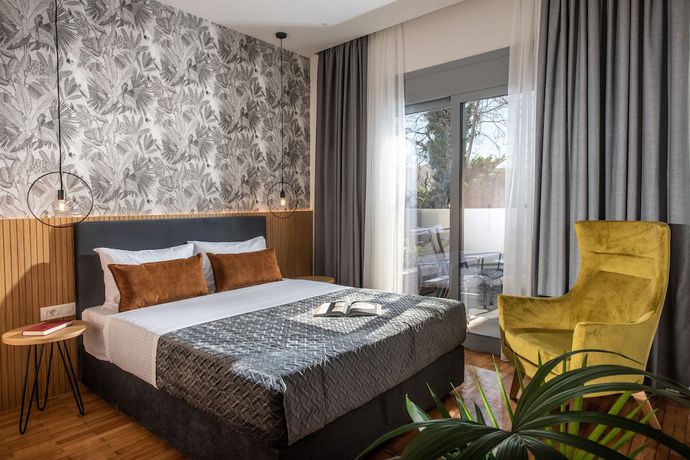 Imagen de la habitación del Hotel Kipos Boutique Suites. Foto 3