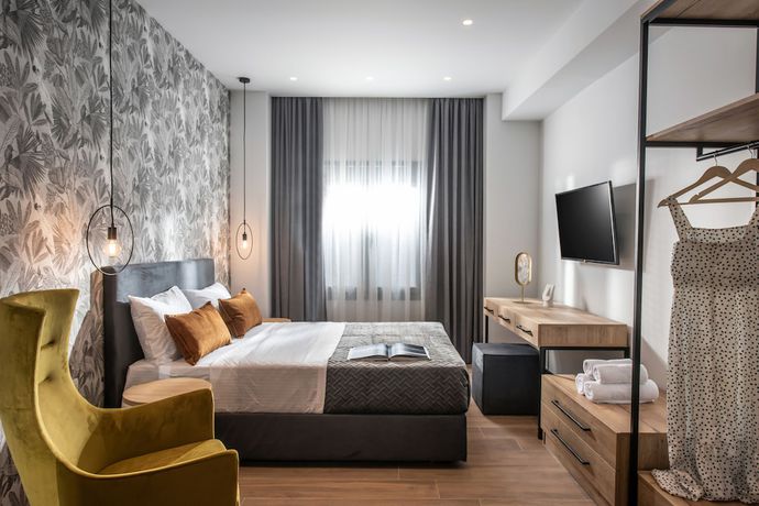 Imagen de la habitación del Hotel Kipos Boutique Suites. Foto 10