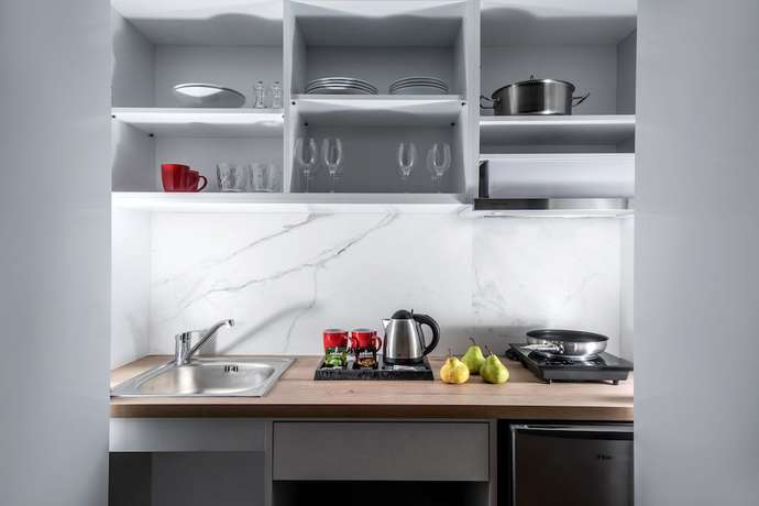 Imagen de la habitación del Hotel Kipos Boutique Suites. Foto 14
