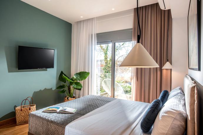 Imagen de la habitación del Hotel Kipos Boutique Suites. Foto 16