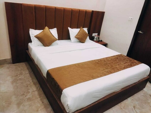 Imagen de la habitación del Hotel Kiran Palace Varanasi. Foto 16