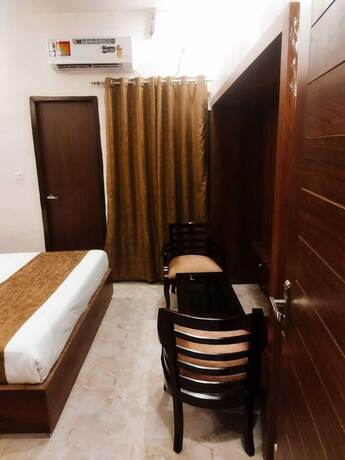 Imagen de la habitación del Hotel Kiran Palace Varanasi. Foto 17