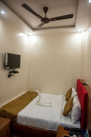 Imagen de la habitación del Hotel Kiran Palace Varanasi. Foto 18