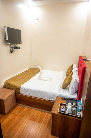 Imagen de la habitación del Hotel Kiran Palace Varanasi. Foto 23