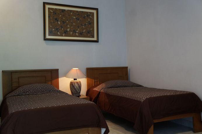 Imagen de la habitación del Hotel Kirana. Foto 15