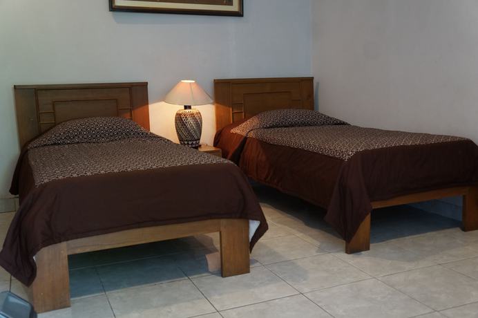 Imagen de la habitación del Hotel Kirana. Foto 18