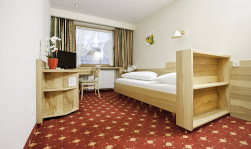 Imagen de la habitación del Hotel Kirchenwirt, Reith im Alpbachtal. Foto 9