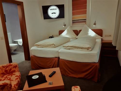 Imagen de la habitación del Hotel Kirchplatz. Foto 2