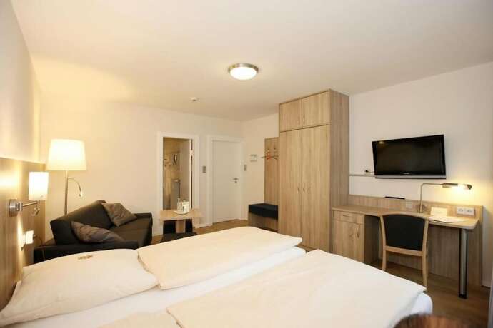 Imagen de la habitación del Hotel Kirchspiels Gasthaus. Foto 11