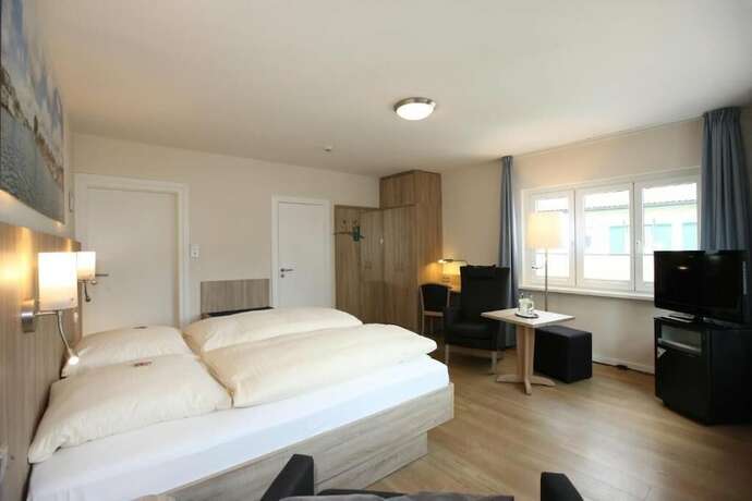 Imagen de la habitación del Hotel Kirchspiels Gasthaus. Foto 13
