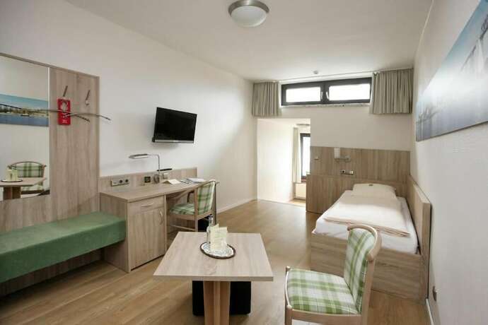 Imagen de la habitación del Hotel Kirchspiels Gasthaus. Foto 19