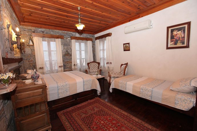 Imagen de la habitación del Hotel Kirkinca Houses and Boutique. Foto 3