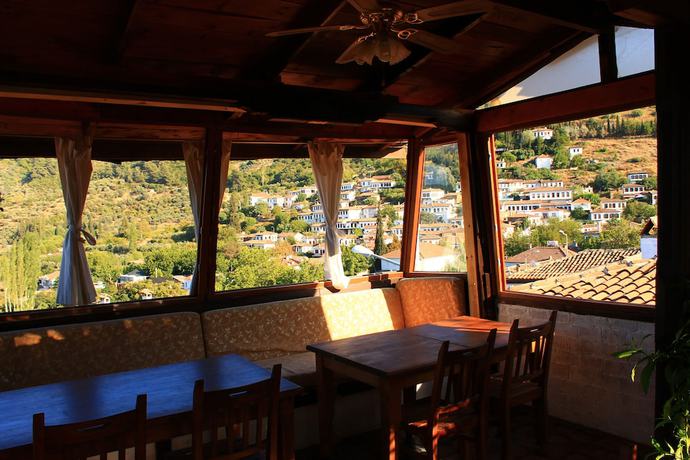 Imagen de los interiores del Hotel Kirkinca Houses and Boutique. Foto 20