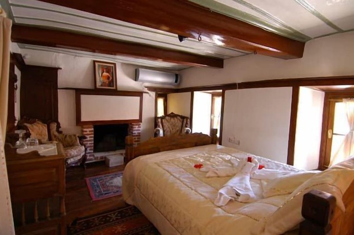 Imagen de la habitación del Hotel Kirkinca Houses and Boutique. Foto 15
