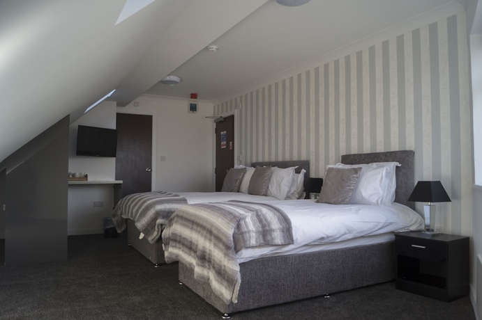 Imagen de la habitación del Hotel Kirks Korner. Foto 12