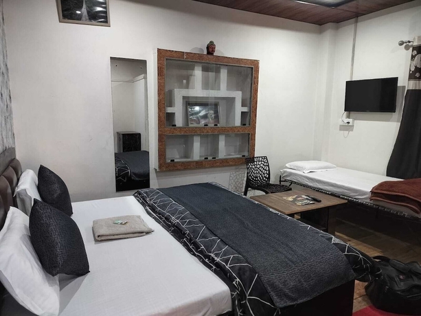 Imagen de la habitación del Hotel Kishan Home Stay. Foto 5