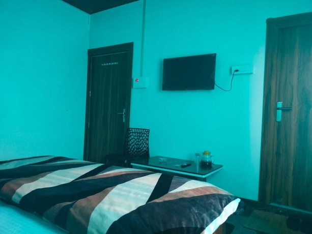 Imagen de la habitación del Hotel Kishan Home Stay. Foto 7