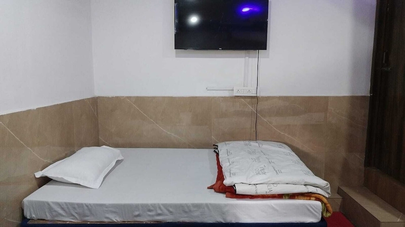Imagen de la habitación del Hotel Kishan Home Stay. Foto 8