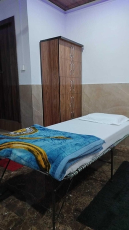 Imagen de la habitación del Hotel Kishan Home Stay. Foto 9