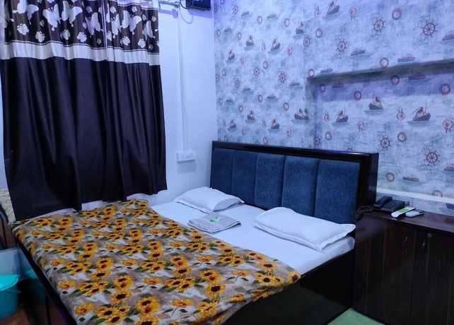 Imagen de la habitación del Hotel Kishan Home Stay. Foto 10