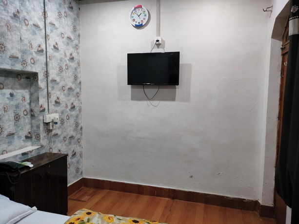 Imagen de la habitación del Hotel Kishan Home Stay. Foto 11