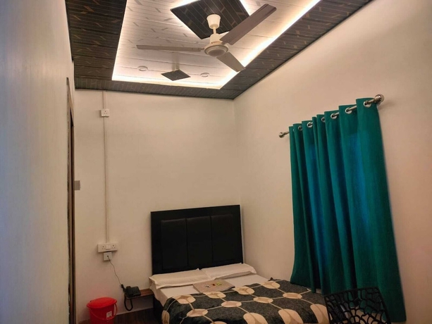 Imagen de la habitación del Hotel Kishan Home Stay. Foto 14