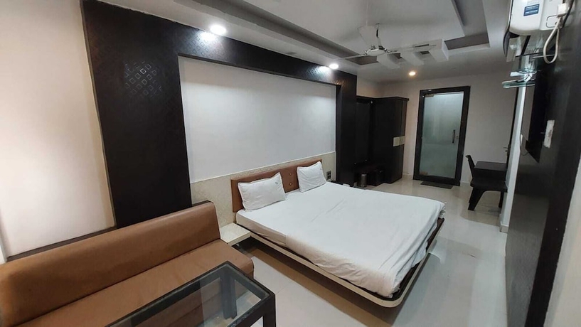 Imagen de la habitación del Hotel Kishan Palace Bhopal. Foto 9