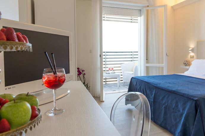 Imagen de la habitación del Hotel Kiss Beachfront and Restaurant. Foto 13