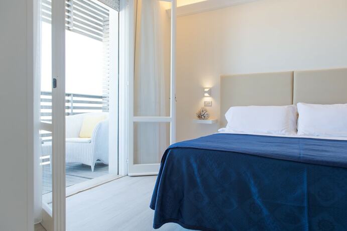 Imagen de la habitación del Hotel Kiss Beachfront and Restaurant. Foto 20
