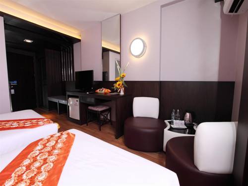 Imagen de la habitación del Hotel Kiss Gardenhome Chic. Foto 5