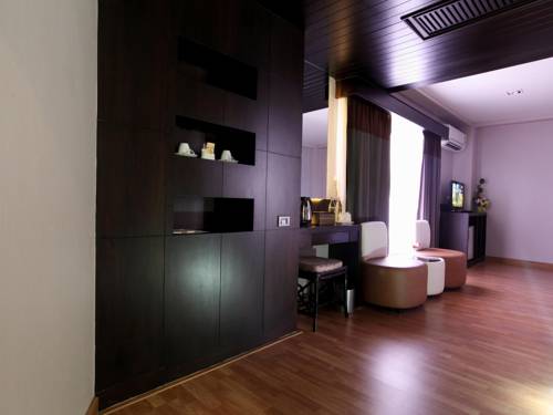 Imagen de la habitación del Hotel Kiss Gardenhome Chic. Foto 6