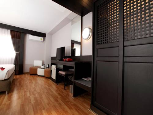 Imagen de la habitación del Hotel Kiss Gardenhome Chic. Foto 7