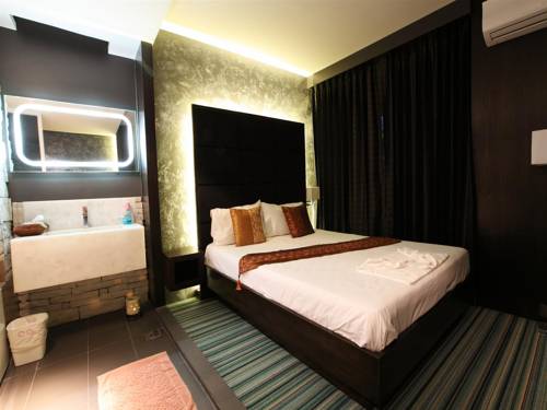 Imagen de la habitación del Hotel Kiss Gardenhome Chic. Foto 8