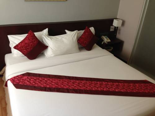 Imagen de la habitación del Hotel Kiss Gardenhome Chic. Foto 10