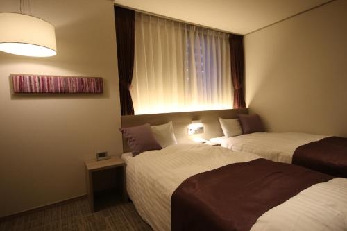 Imagen de la habitación del Hotel Kita, Morioka. Foto 8