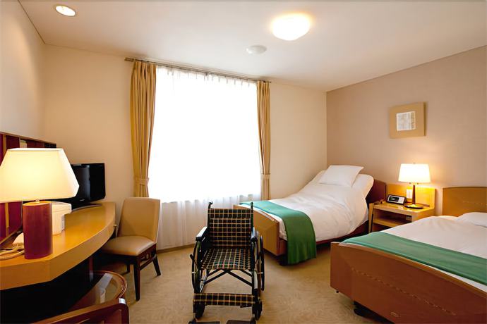 Imagen de la habitación del Hotel Kitano Plaza Rokkoso. Foto 17