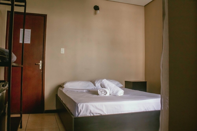 Imagen de la habitación del Hotel Kitnet no centro de Betim. Foto 1