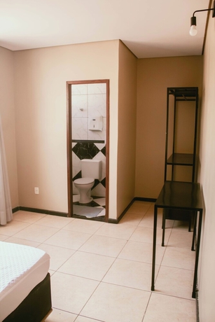 Imagen de la habitación del Hotel Kitnet no centro de Betim. Foto 2