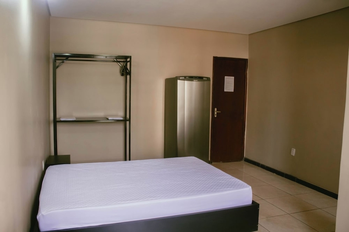 Imagen de la habitación del Hotel Kitnet no centro de Betim. Foto 3