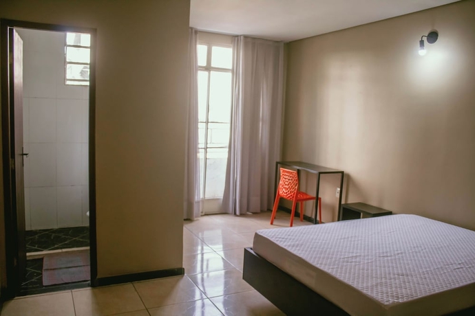Imagen de la habitación del Hotel Kitnet no centro de Betim. Foto 4